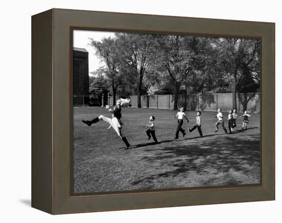 Uniformed Drum Major For University of Michigan Marching Band Practicing His High Kicking Prance-Alfred Eisenstaedt-Framed Premier Image Canvas