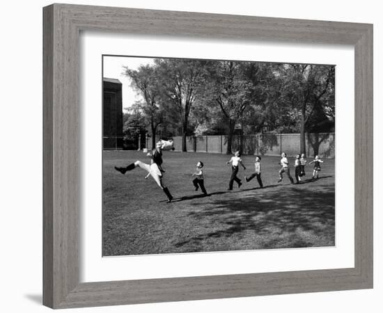 Uniformed Drum Major For University of Michigan Marching Band Practicing His High Kicking Prance-Alfred Eisenstaedt-Framed Photographic Print