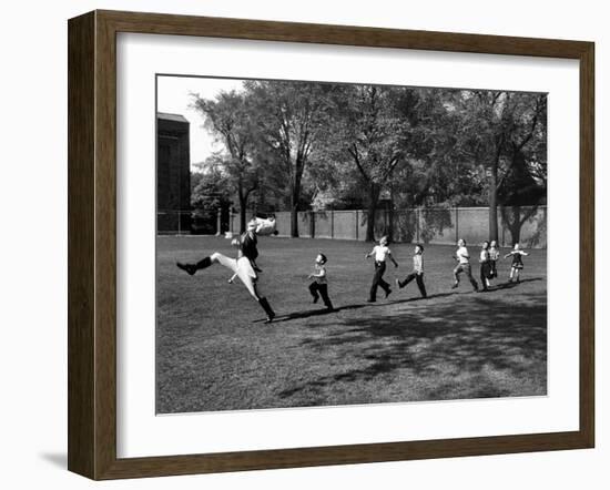 Uniformed Drum Major For University of Michigan Marching Band Practicing His High Kicking Prance-Alfred Eisenstaedt-Framed Photographic Print