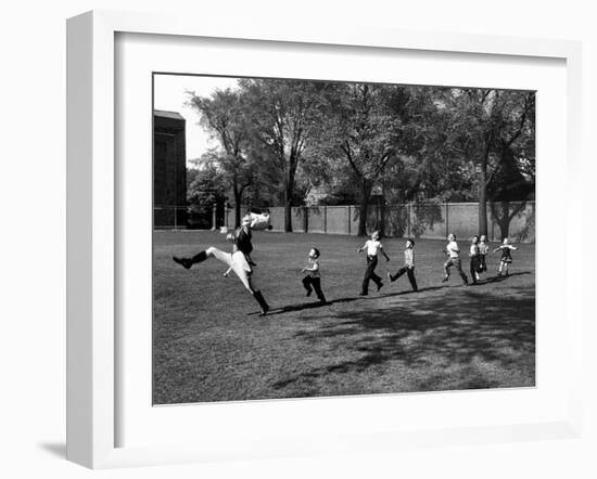 Uniformed Drum Major For University of Michigan Marching Band Practicing His High Kicking Prance-Alfred Eisenstaedt-Framed Photographic Print
