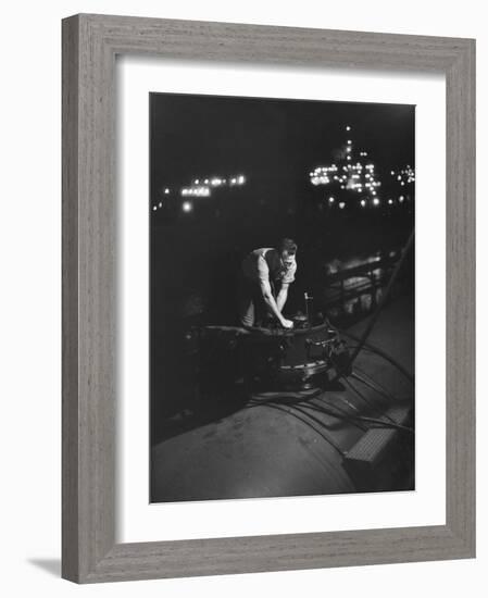 Union Carbide Company Employee Loading Tank Cars with Butadiene-Ralph Morse-Framed Photographic Print