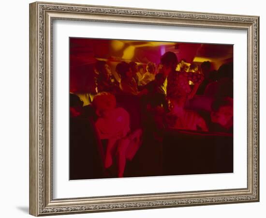 United Airlines Flight Attendants Participate in an Evacuation Drill and Safety Training, 1966-Yale Joel-Framed Photographic Print