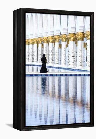 United Arab Emirates, Abu Dhabi. Arabic Woman Walking Inside Sheikh Zayed Grand Mosque-Matteo Colombo-Framed Premier Image Canvas