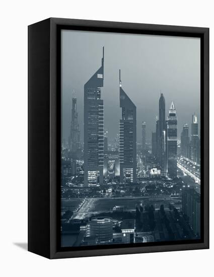 United Arab Emirates, Dubai, Sheik Zayed Road, Emirates Towers-Walter Bibikow-Framed Premier Image Canvas