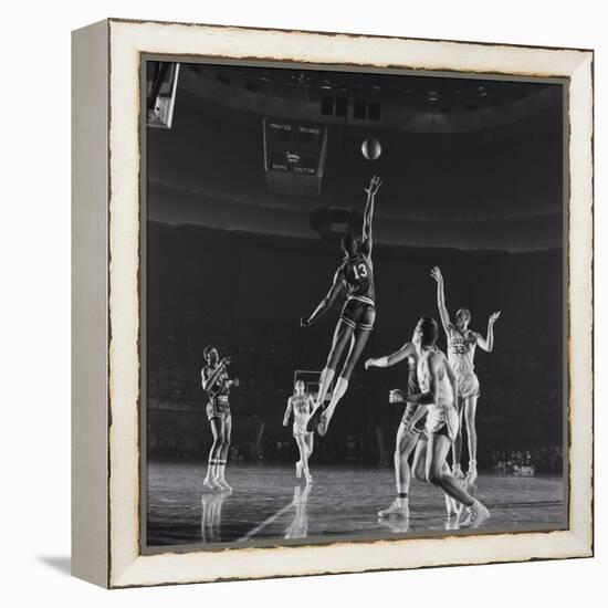 University of Kansas Basketball Player Wilt Chamberlain (C) Playing in a School Game, 1957-George Silk-Framed Premier Image Canvas