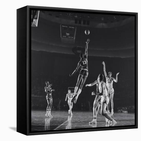 University of Kansas Basketball Player Wilt Chamberlain (C) Playing in a School Game, 1957-George Silk-Framed Premier Image Canvas