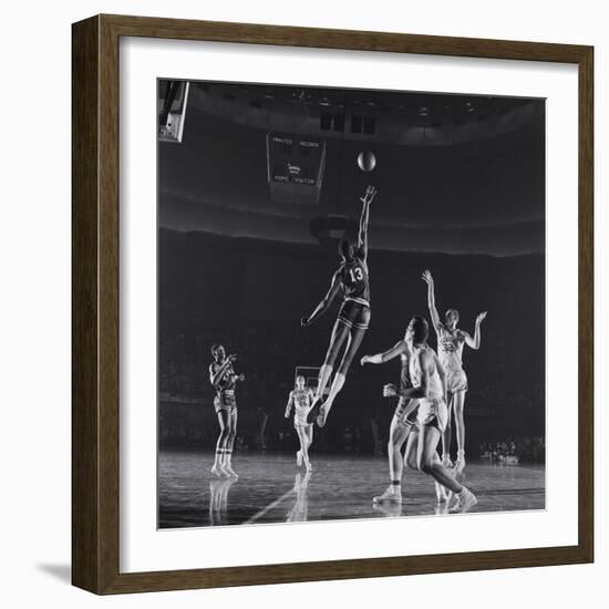 University of Kansas Basketball Player Wilt Chamberlain (C) Playing in a School Game, 1957-George Silk-Framed Photographic Print