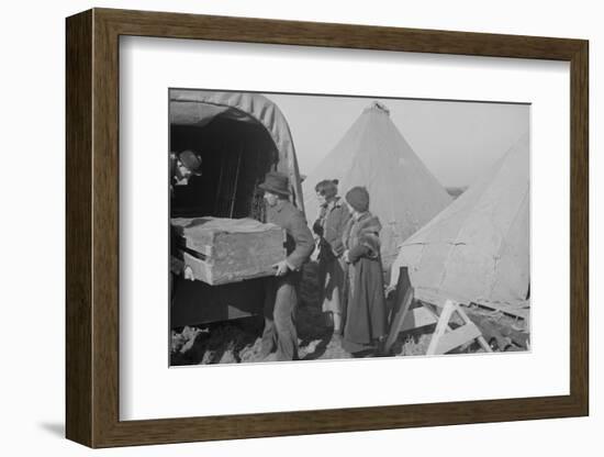 Unloading household goods of a family of flood refugees in camp at Forrest City, Arkansas, 1937-Walker Evans-Framed Photographic Print