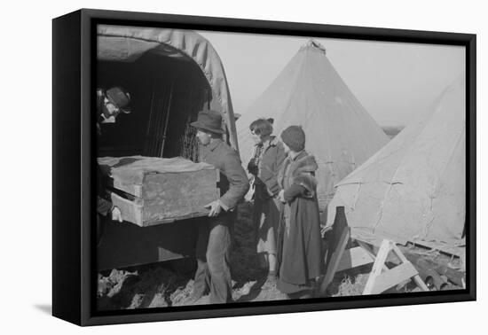 Unloading household goods of a family of flood refugees in camp at Forrest City, Arkansas, 1937-Walker Evans-Framed Premier Image Canvas