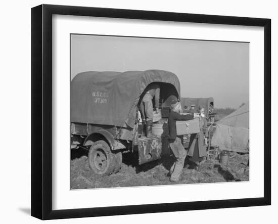 Unloading the goods of a family being moved into the camp for refugees at Forrest City, Arkansas-Walker Evans-Framed Photographic Print