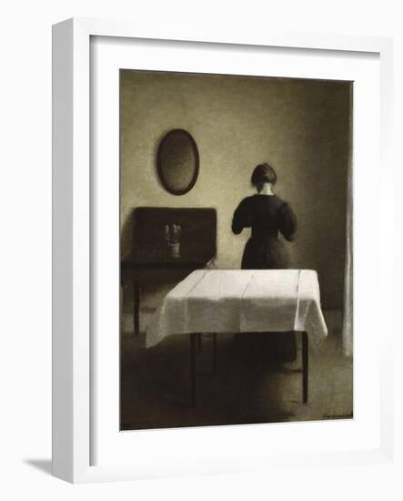 Untitled (Woman with Her Back Turned in a Dark Domestic Interior)-Vilhelm Hammershoi-Framed Giclee Print