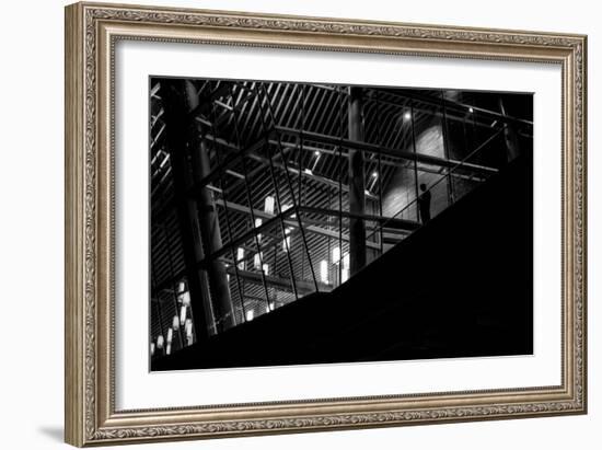 Urban Scene with Modern Building and Silhouetted Figure on Balcony-Sharon Wish-Framed Photographic Print