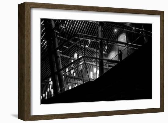 Urban Scene with Modern Building and Silhouetted Figure on Balcony-Sharon Wish-Framed Photographic Print