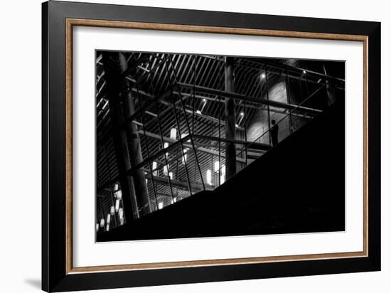 Urban Scene with Modern Building and Silhouetted Figure on Balcony-Sharon Wish-Framed Photographic Print