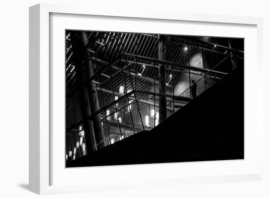 Urban Scene with Modern Building and Silhouetted Figure on Balcony-Sharon Wish-Framed Photographic Print