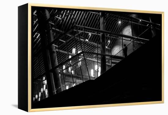 Urban Scene with Modern Building and Silhouetted Figure on Balcony-Sharon Wish-Framed Premier Image Canvas