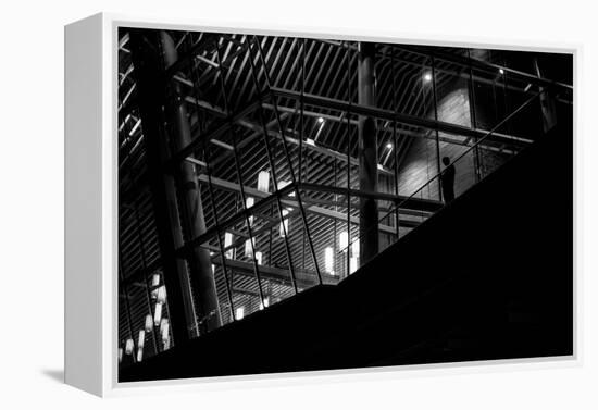 Urban Scene with Modern Building and Silhouetted Figure on Balcony-Sharon Wish-Framed Premier Image Canvas