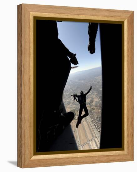 US Air Force Academy Parachute Team Jumps Out of an Aircraft over Nellis Air Force Base, Nevada-null-Framed Premier Image Canvas