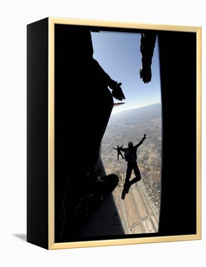 US Air Force Academy Parachute Team Jumps Out of an Aircraft over Nellis Air Force Base, Nevada-null-Framed Premier Image Canvas