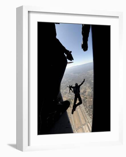 US Air Force Academy Parachute Team Jumps Out of an Aircraft over Nellis Air Force Base, Nevada-null-Framed Photographic Print