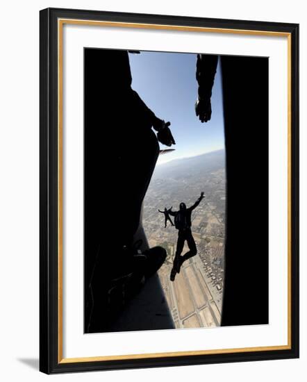 US Air Force Academy Parachute Team Jumps Out of an Aircraft over Nellis Air Force Base, Nevada-null-Framed Photographic Print