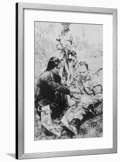 US Air Force Pilot Is Given First Aid by North Vietnam Captors in Jan. 1966-null-Framed Photo