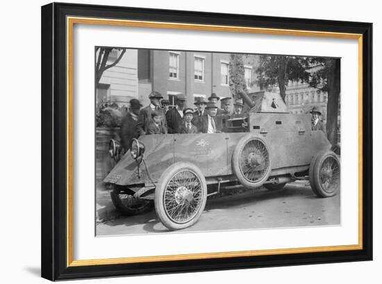 Us Army Armored Truck With Machine Gun Is Gawked By Onlookers on a Washington Street-null-Framed Art Print