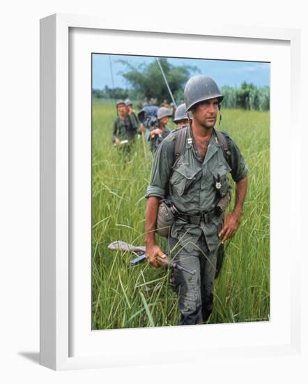 US Army Captain Robert Bacon Leading a Patrol During the Early Years of the Vietnam War-Larry Burrows-Framed Photographic Print