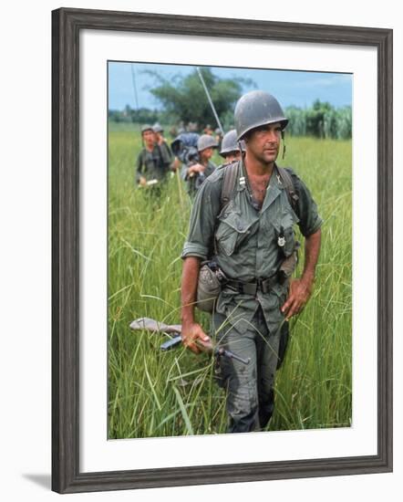 US Army Captain Robert Bacon Leading a Patrol During the Early Years of the Vietnam War-Larry Burrows-Framed Photographic Print