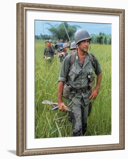 US Army Captain Robert Bacon Leading a Patrol During the Early Years of the Vietnam War-Larry Burrows-Framed Photographic Print