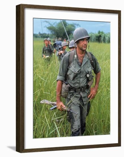 US Army Captain Robert Bacon Leading a Patrol During the Early Years of the Vietnam War-Larry Burrows-Framed Photographic Print