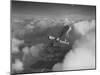 US Army's Ryan, Dragonfly, YO-51 Observation Plane Soaring Above the Clouds-Peter Stackpole-Mounted Photographic Print
