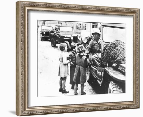 Us Army Soldier Greeting Children with Sweets, Germany, 1945-null-Framed Photographic Print