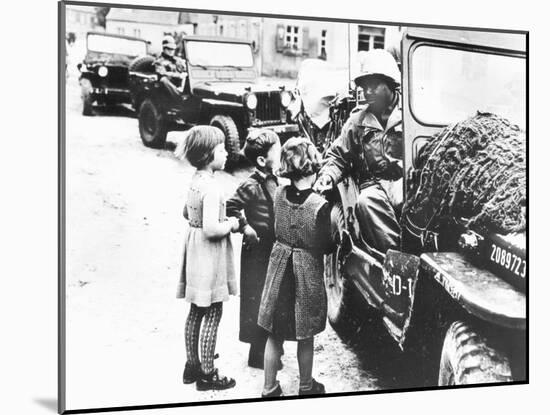 Us Army Soldier Greeting Children with Sweets, Germany, 1945-null-Mounted Photographic Print