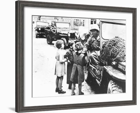 Us Army Soldier Greeting Children with Sweets, Germany, 1945-null-Framed Photographic Print