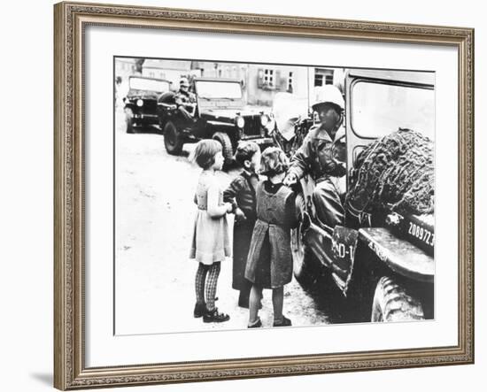 Us Army Soldier Greeting Children with Sweets, Germany, 1945-null-Framed Photographic Print