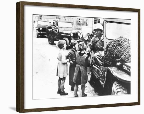 Us Army Soldier Greeting Children with Sweets, Germany, 1945-null-Framed Photographic Print