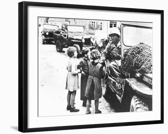 Us Army Soldier Greeting Children with Sweets, Germany, 1945-null-Framed Photographic Print