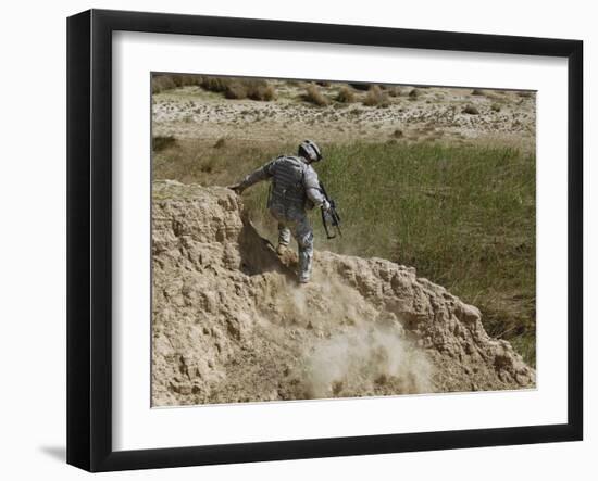 US Army Specialist Climbs Down to the Bottom of a Canal During a Foot Patrol in Iraq-Stocktrek Images-Framed Photographic Print