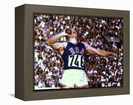 US Athlete in Action During the Shot Put at the Summer Olympics-John Dominis-Framed Premier Image Canvas