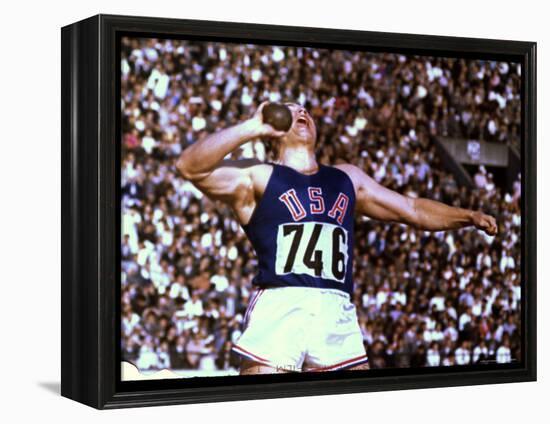 US Athlete in Action During the Shot Put at the Summer Olympics-John Dominis-Framed Premier Image Canvas