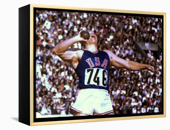 US Athlete in Action During the Shot Put at the Summer Olympics-John Dominis-Framed Premier Image Canvas