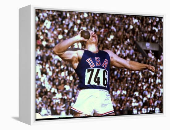 US Athlete in Action During the Shot Put at the Summer Olympics-John Dominis-Framed Premier Image Canvas