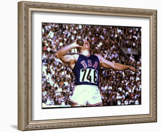 US Athlete in Action During the Shot Put at the Summer Olympics-John Dominis-Framed Photographic Print