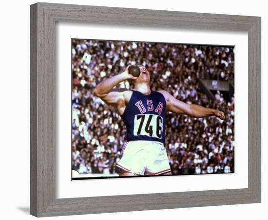 US Athlete in Action During the Shot Put at the Summer Olympics-John Dominis-Framed Photographic Print