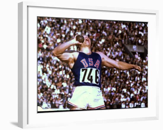 US Athlete in Action During the Shot Put at the Summer Olympics-John Dominis-Framed Photographic Print