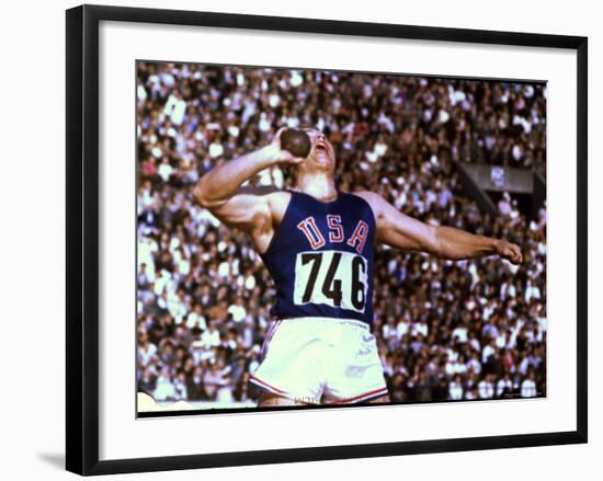 US Athlete in Action During the Shot Put at the Summer Olympics-John Dominis-Framed Photographic Print