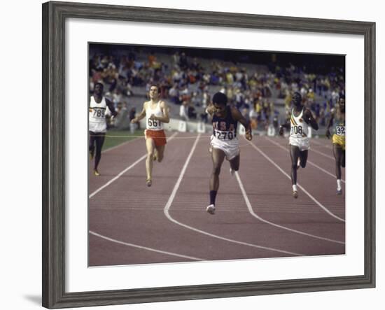 US Athlete Lee Evans Going Through Finish Line During Race at Summer Olympics-null-Framed Premium Photographic Print