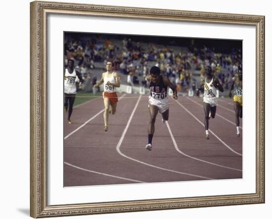 US Athlete Lee Evans Going Through Finish Line During Race at Summer Olympics-null-Framed Premium Photographic Print