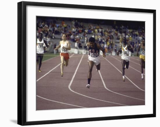 US Athlete Lee Evans Going Through Finish Line During Race at Summer Olympics-null-Framed Premium Photographic Print